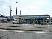 【コンビニエンスストア】ファミリーマート石本金山店まで1100ｍ