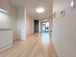 スモールウッズタウン　レクスII 104 1階1LDKのリビング/ダイニング