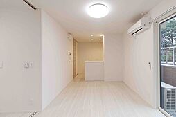 にゅうまごびれっじIV 101 1階1LDKのリビング/ダイニング