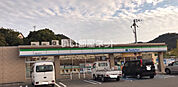 【コンビニエンスストア】ファミリーマート関戸店まで1181ｍ