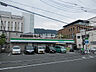 周辺：【コンビニエンスストア】ファミリーマート 四条畷駅前店まで1023ｍ