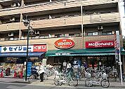 【スーパー】ニューヤヒロパルケ稲田堤駅前店まで877ｍ