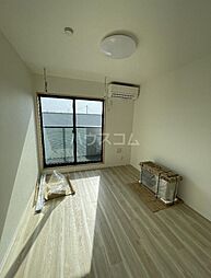 オーパス三郷中央 2階1Kのリビング/ダイニング