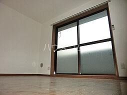 スチューデントマンション A-2 1階1Kのリビング/ダイニング